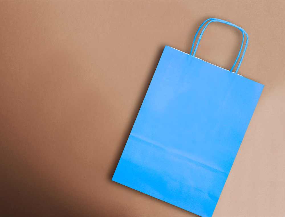 BOLSA PAPEL Q-CONNECT CELULOSA CELESTE M CON ASA RETORCIDA 270X370X120 MM